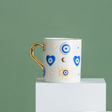 Geometric Evil Eye Mug | Gold Handle Morning Beverage Use